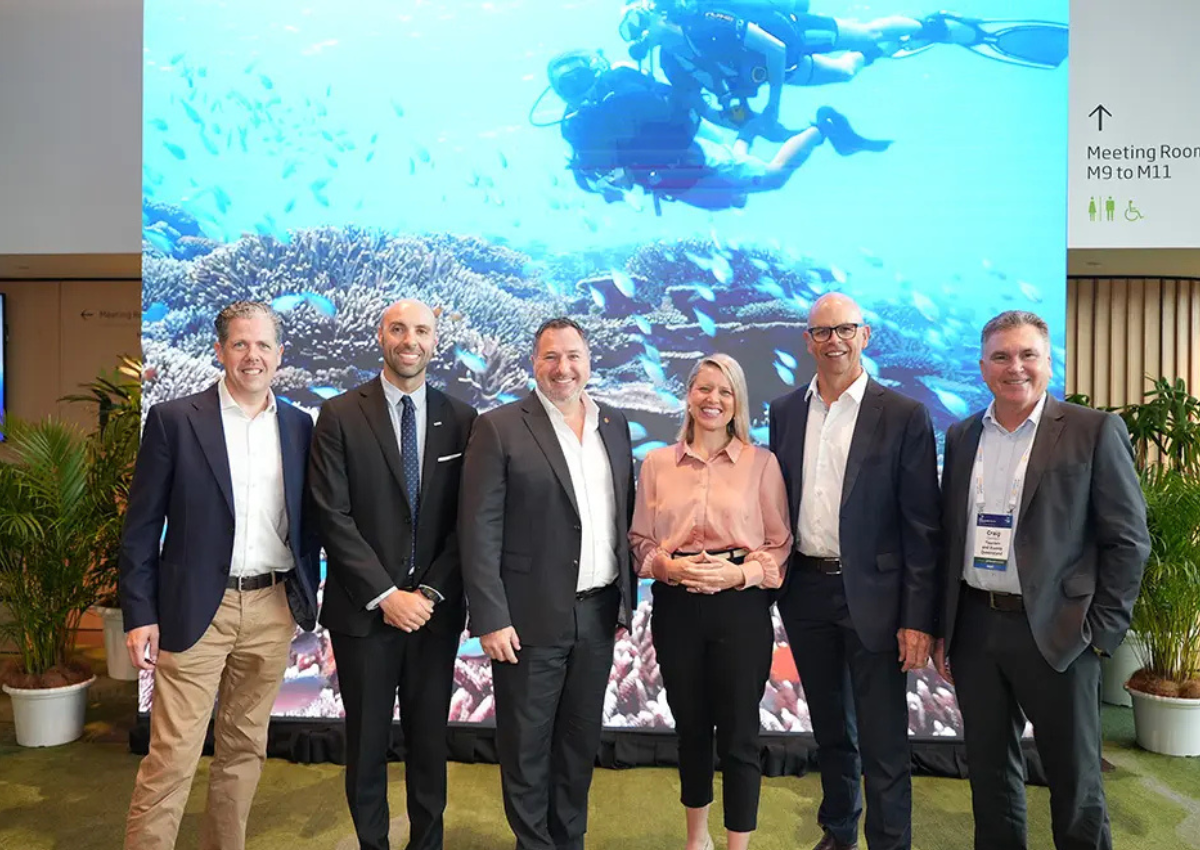 (L–R): Mark Olsen, CEO TTNQ; Marco Navarria, Senior Director – Content & Marketing at CAPA; Andrew Powell, Minister for Tourism; Bree James, Assistant Minister for Tourism; Richard Barker, CEO Cairns Airport; and Craig Davidson, CEO TEQ.