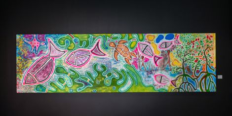 ‘Reef Connections’ by Elvernia Johnson, a Gungganji Gurugulu and Gimuy Walubara Yidinji artist, depicting colourful reef life including fish, turtles, and coral